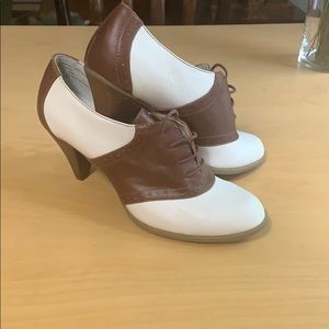 NWOT Saddle shoes with a two inch heel.